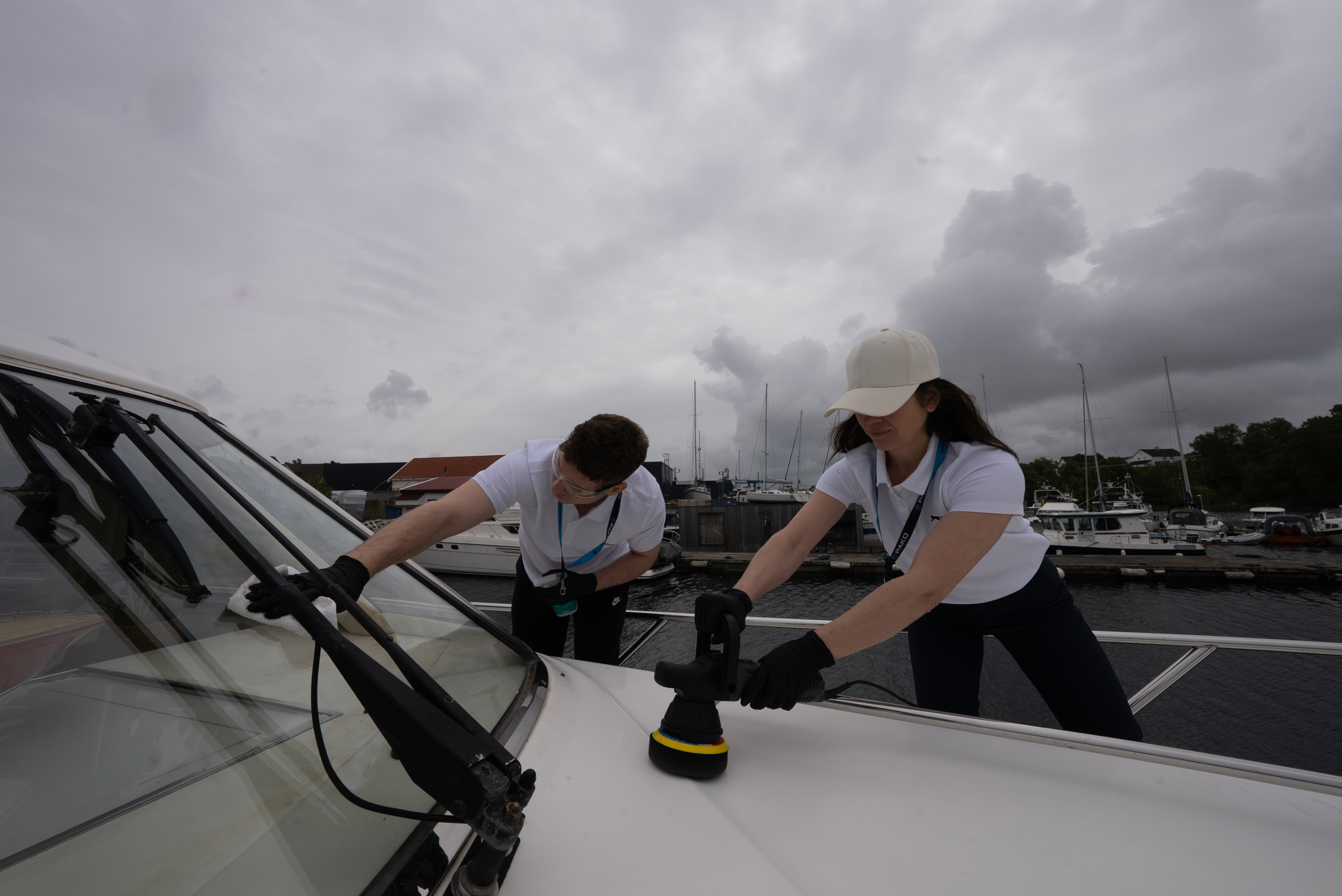 Motor yacht detailing — hull polish and wax application